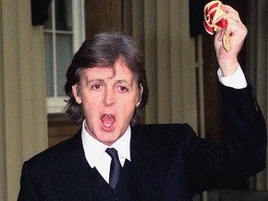 McCartney showing off his medal after becoming knighted (Photo courtesy of digital sky.co.uk)